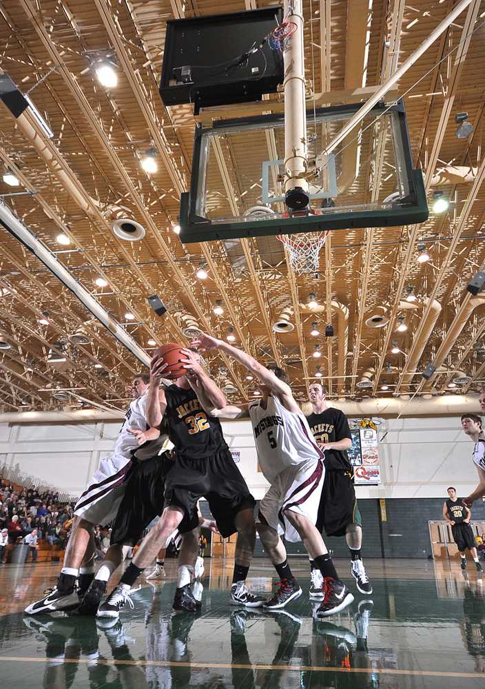 Will John Johnson (32) makes the rebound against Mount Marty on Oct. 30