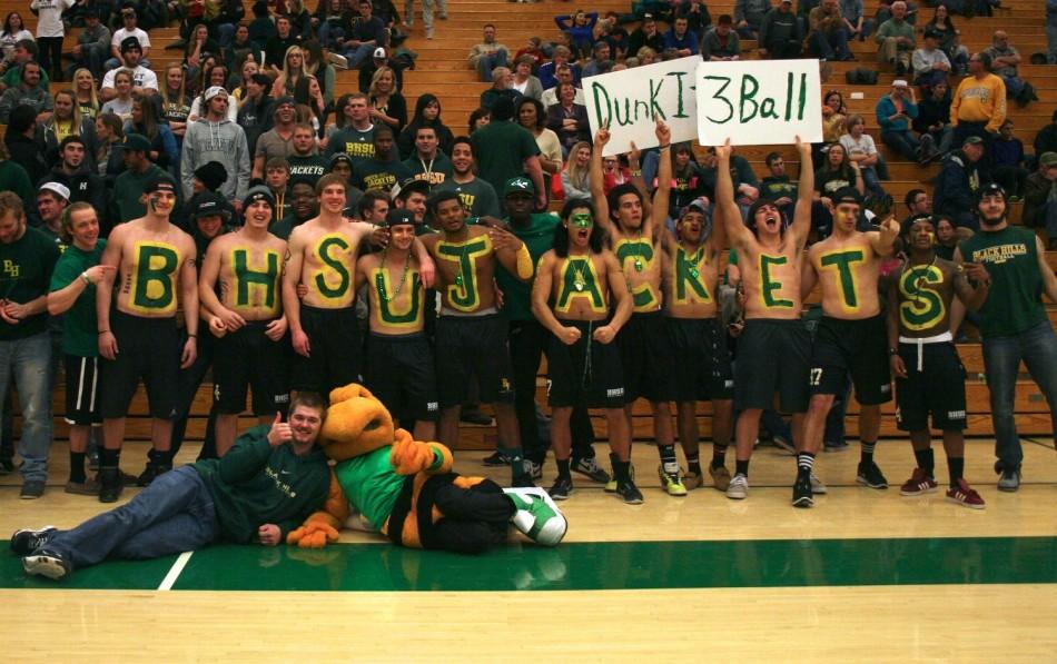 BHSU+students+show+off+their+team+spirit+at+a+basketball+game.+