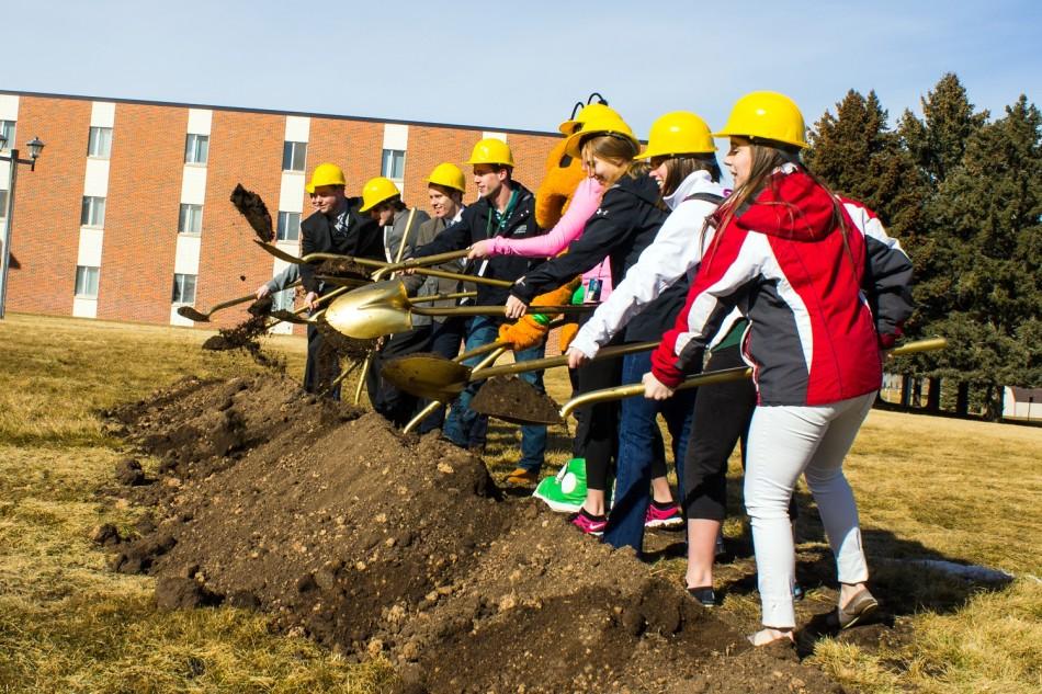 Students help out at the new resident hall's ground breaking ceremony on Feb 14th