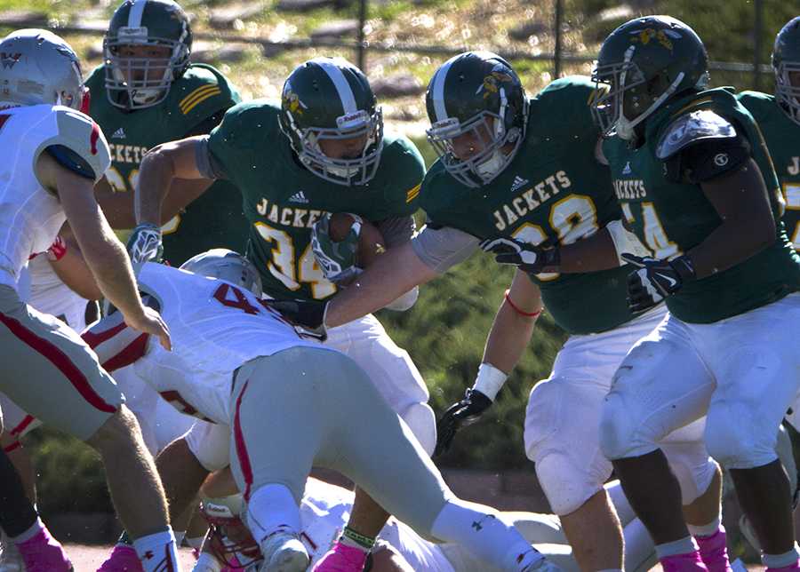 Travis Groves takes the ball during Swarm Week's Oct. 10 game.