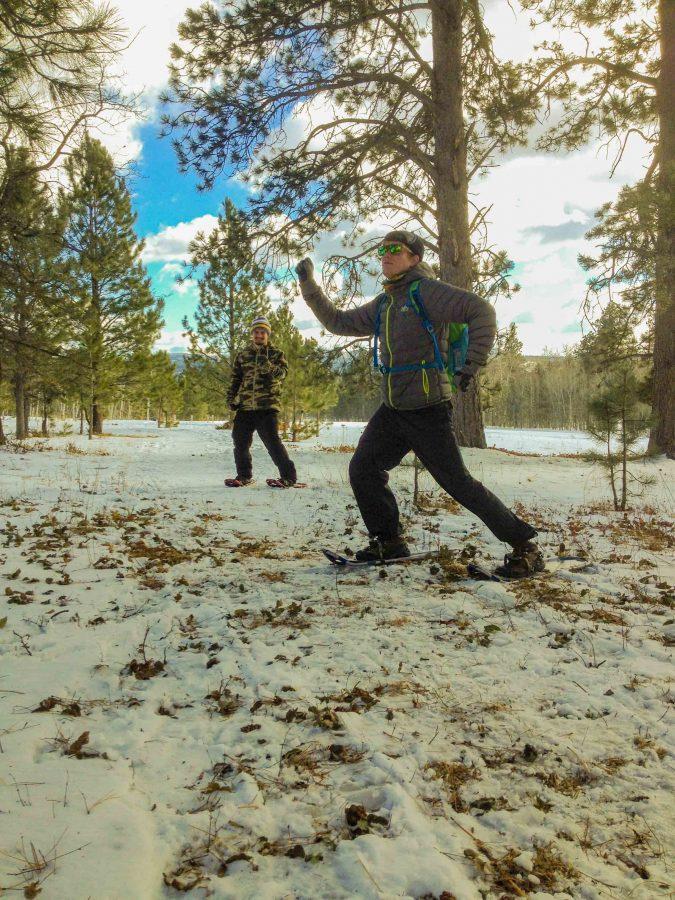 Dave Cowley strikes a pose as Ross Edison laughs during the Snowshoe and Cross-country Ski event Jan. 7at Big Hill Trails in Spearfish.