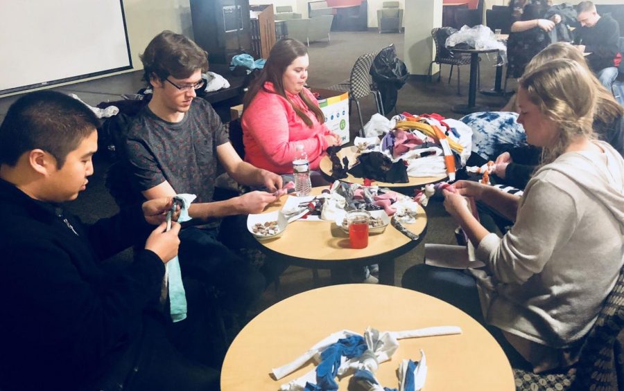 Students Use Recycled Shirts to Make Toys for Dogs 