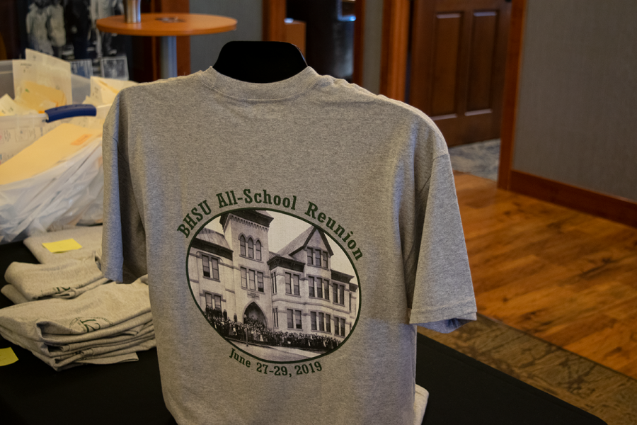 A commemorative T-shirt is set on display at the Joy Center. Merchandise and souvenirs were available for purchase at the breakfast receptions.