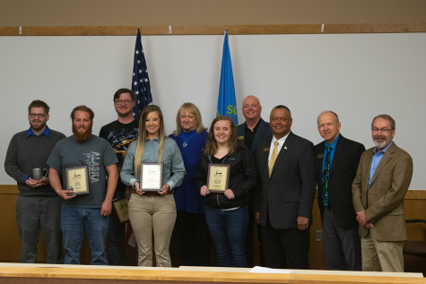 Presenters and recipients at the 2019 Student Recognition Awards display their awards. From left to right: Brandyn Johnson, Terry Irvine, Dennis Morton, Dreena Streckfuss, Julie Scott, Brynne Dilley, Charles Knauer, Tom Jackson, Jr., Gene Bilodeau, Greg Farley.
