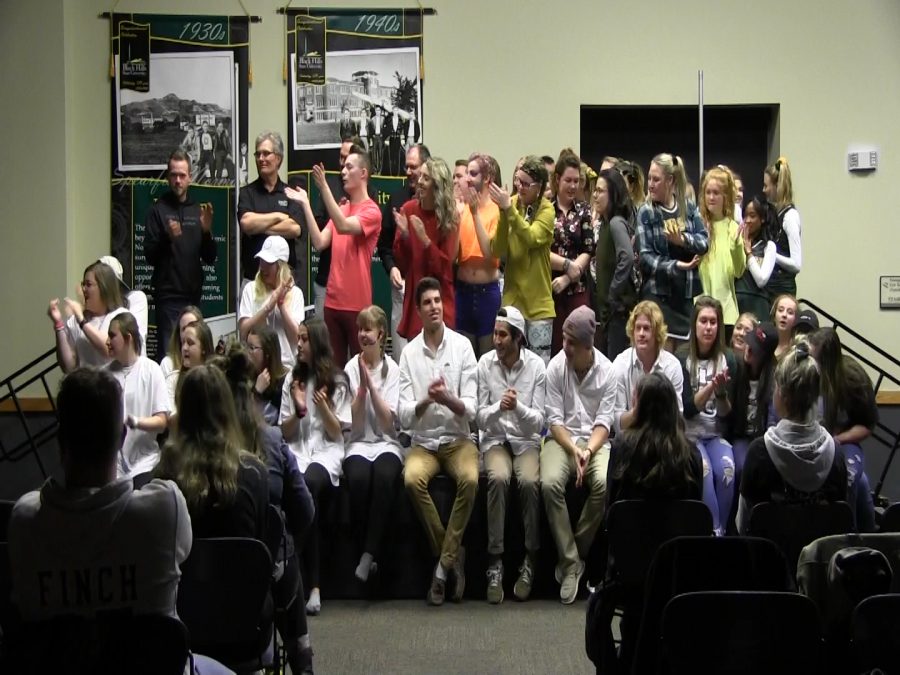 Competing teams gather onstage at the Lip Sync Battle. Each team performed its own choreographed lip syncing routine.