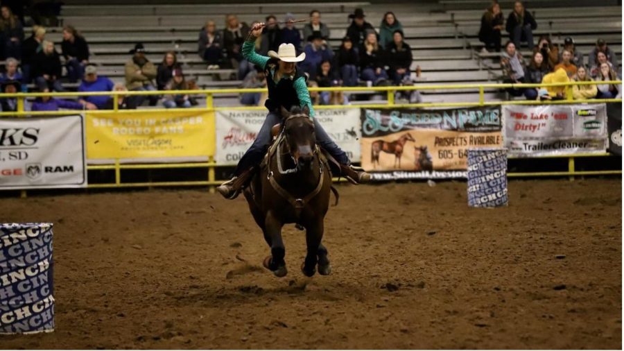 BHSU women's barrel racer (So. Tessa Caspers) competes in Sevens Down Arena, Spearfish, SD. Black Hills State Men's and Women's rodeo teams host 2022 Will Lantis Yellow Jacket Stampede.