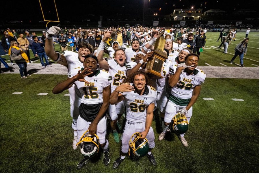 BHSU players (left to right) Cameron Rieman, Joshua Ahononu, Bailey Roenstrauch, Doodles Quinones, TJ Chuckwurah, and Malik Edwards celebrate the 137th annual Black Hills Brawl. Yellowjackets win Homestake trophy over South Dakota School of Mines (24-17).