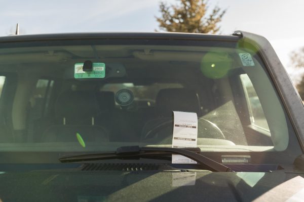 A vehicle with a parking ticket on campus at Black Hills State University.