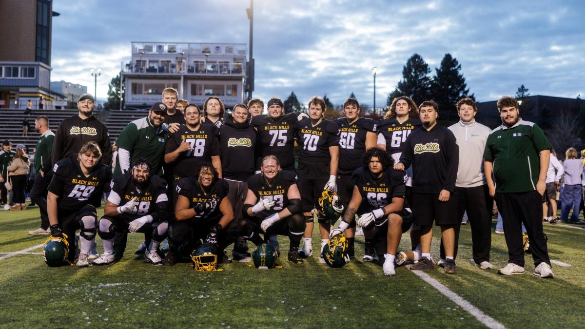 BHSU Yellow Jacket Football team celebrates a win in the final game of the season, Nov. 15.