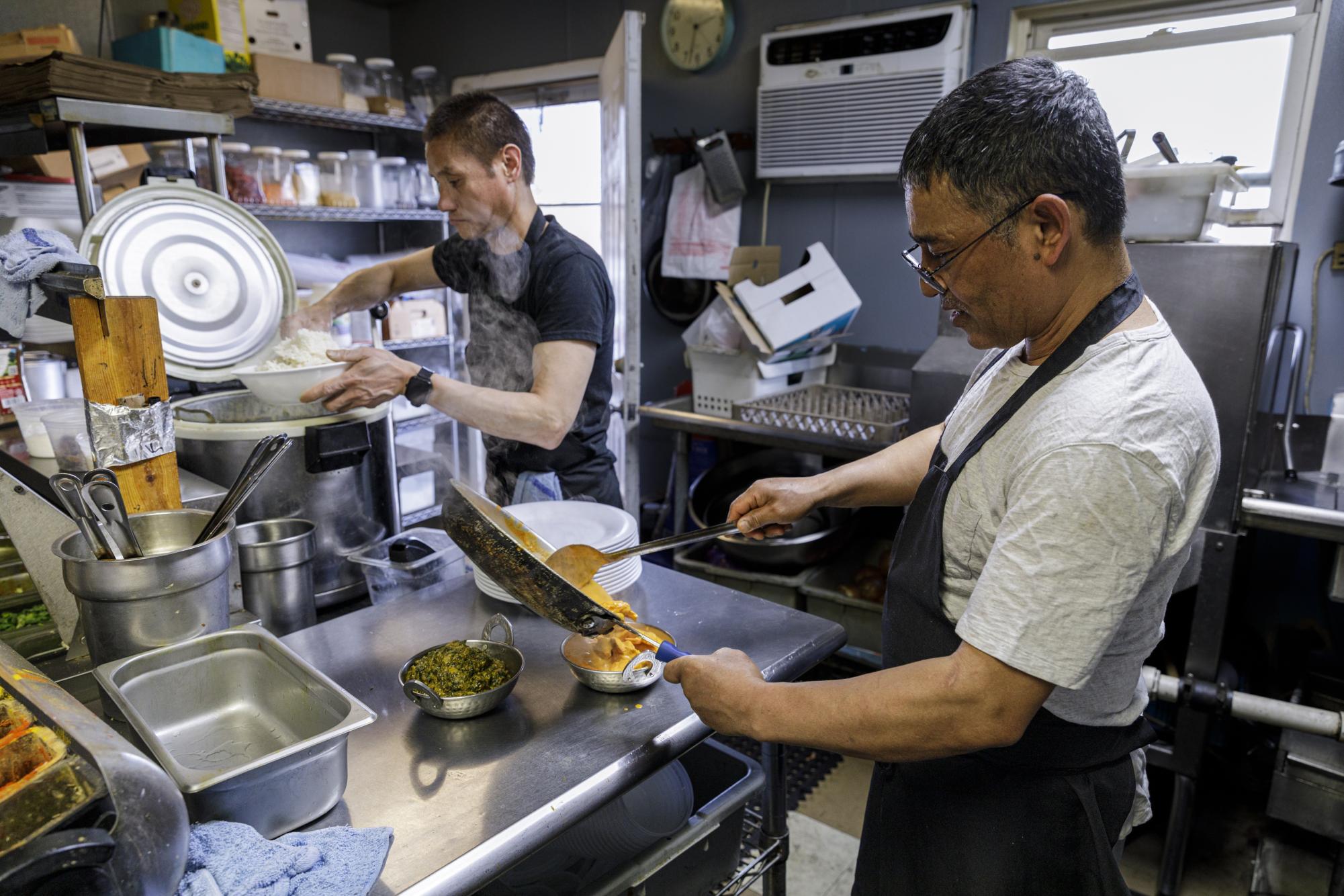 Narayan GC prepares a meal at Everest Cuisine in Rapid City, S.D.